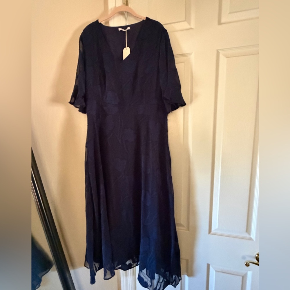 Flowing Navy Blue Midi Dress with Subtle Floral Texture